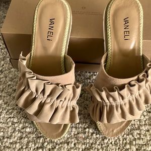 Beige suede slip on slides